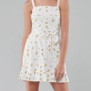 White and yellow floral tie dress